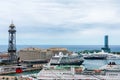 Aerial view of Barcelona cruise port terminals with docked cruise ships from Montjuic hill. Port Vell Aerial Tramway cabin with Royalty Free Stock Photo