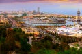 Aerial view of Barcelona on Mediterranean coast with seaport in evening Royalty Free Stock Photo