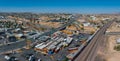 Aerial View of Barstow Station in Arid California Landscape with Beige Buildings and Light Traffic