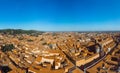 Aerial view of Basilica di San Petronio, Bologna, Italy at sunset. Colorful sky over the historical city center with car traffic Royalty Free Stock Photo