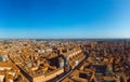 Aerial view of Basilica di San Petronio, Bologna, Italy at sunset. Colorful sky over the historical city center with car traffic Royalty Free Stock Photo