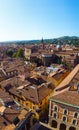 Aerial view of Basilica of San Domenico, Bologna, Italy at sunset. Colorful sky over the historical city center with car traffic Royalty Free Stock Photo