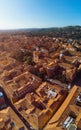 Aerial view of Basilica of San Domenico, Bologna, Italy at sunset. Colorful sky over the historical city center with car traffic Royalty Free Stock Photo