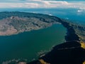 Aerial view of Batur volcano with lake and sea in Bali Royalty Free Stock Photo