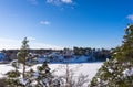 Aerial view of the Bay of the Baltic sea with rocky coasts in winter day. Winter snowy landscape of the Swedish coast on blue sky Royalty Free Stock Photo