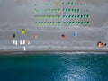 Aerial view of a beach with canoes, boats and umbrellas. Praia a Mare, Province of Cosenza, Calabria, Italy