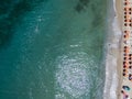 Aerial view of a beach with canoes, boats and umbrellas Royalty Free Stock Photo