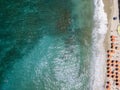 Aerial view of a beach with canoes, boats and umbrellas Royalty Free Stock Photo