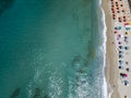 Aerial view of a beach with canoes, boats and umbrellas Royalty Free Stock Photo