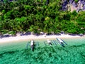Aerial view of the beach with fishing boats. Elnido, Philippines, 2018