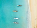 Aerial view of beach with four boats Royalty Free Stock Photo