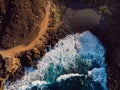 Aerial view of beach with lava cliff and ocean waves. Lanzarote, Canary Islands