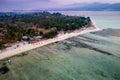 Aerial view of a beach resort on a small tropical island at sunset (Gili Air, Indonesia Royalty Free Stock Photo