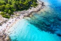 Aerial view on the beach, stones and azure sea. Beach and sea from air. Summer seascape from drone. Croatia landscape