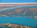Aerial view of the beautiful Algarve coast, Parque natural Ria Formosa, in Portugal seen on a flight to Faro Royalty Free Stock Photo