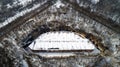 Aerial view of beautiful ancient fortress in forest in winter. Tarakaniv Fort. Royalty Free Stock Photo