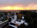 Aerial view beautiful bright sunset with clouds over old church Royalty Free Stock Photo