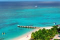 Aerial view on beautiful Caribbean beach and pier in Montego Bay, Jamaica island. Royalty Free Stock Photo