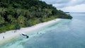 Aerial view of beautiful and clean beach beside blue ocean with nice sky Royalty Free Stock Photo