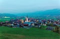 Aerial view of beautiful Ellmau at dusk on a foggy summer evening, a lovely alpine village Royalty Free Stock Photo