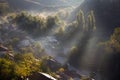 Aerial view of beautiful foggy village between mountains in Lovech, Bulgaria. Misty sunrise view of city district surrounded by
