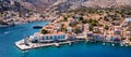 Aerial view of the beautiful greek island of Symi (Simi) with colourful houses and small boats.. Royalty Free Stock Photo