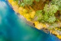 Aerial view of beautiful green waters of lake Gela. Birds eye view of scenic emerald lake surrounded by pine forests. Clouds Royalty Free Stock Photo