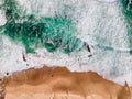 Aerial view of a beautiful Guincho beach with Atlantic Ocean waves rolling on the shoreline at twilight, Cascais, Portugal Royalty Free Stock Photo