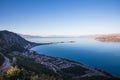 aerial view of beautiful harbour with calm water and town on coast, Royalty Free Stock Photo