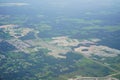 Aerial view of beautiful house, pond, forest and community in Florida