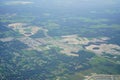 Aerial view of beautiful house, pond, forest and community in Florida