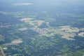 Aerial view of beautiful house, pond, forest and community in Florida