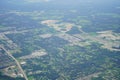 Aerial view of beautiful house, pond, forest and community in Florida