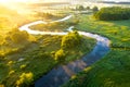 Aerial view of beautiful landscape of foggy river and green fields