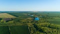 Aerial view beautiful landscape in summer, drone flying over field in sunny day Royalty Free Stock Photo