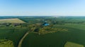 Aerial view beautiful landscape in summer, drone flying over field in sunny day Royalty Free Stock Photo