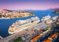 Aerial view of beautiful large white cruise ships at sunset