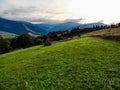 Aerial view of beautiful medow and valley landscape with mountains background Royalty Free Stock Photo