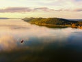 Aerial view  Beautiful Orange and red dramatic colors of sunset and cirrus clouds above the sea. Sky blue and orange natural dawn Royalty Free Stock Photo