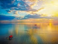 Aerial view  Beautiful Orange and red dramatic colors of sunset and cirrus clouds above the sea. Sky blue and orange natural dawn Royalty Free Stock Photo