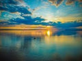 Aerial view  Beautiful Orange and red dramatic colors of sunset and cirrus clouds above the sea. Sky blue and orange natural dawn Royalty Free Stock Photo