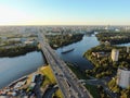 Aerial view beautiful panoramic cityscape at sunset. traffic of cars and passenger ships in the big city. drone shot Royalty Free Stock Photo