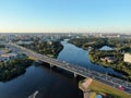 Aerial view beautiful panoramic cityscape at sunset. traffic of cars and passenger ships in the big city. drone shot Royalty Free Stock Photo