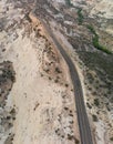 Aerial view of beautiful road corssing the canyon in summer season Royalty Free Stock Photo