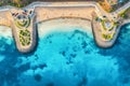 Aerial view of beautiful sandy beach, clear blue sea, promenade