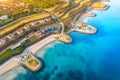 Aerial view of beautiful sandy beach and cottage town