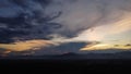 Aerial view of beautiful sky with clouds and sunlight during sunset. Time lapse of the clouds above the sky with the golden rays Royalty Free Stock Photo