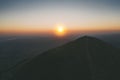 Aerial view of beautiful sunrise over Rtanj mountain peak Royalty Free Stock Photo