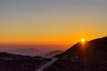 Aerial view of a Beautiful Sunset over the Mountains of Crete Island, Greece. Natural Scenery with the Sun Fading. Royalty Free Stock Photo