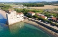 Aerial view of beautiful tower in front of the ocean